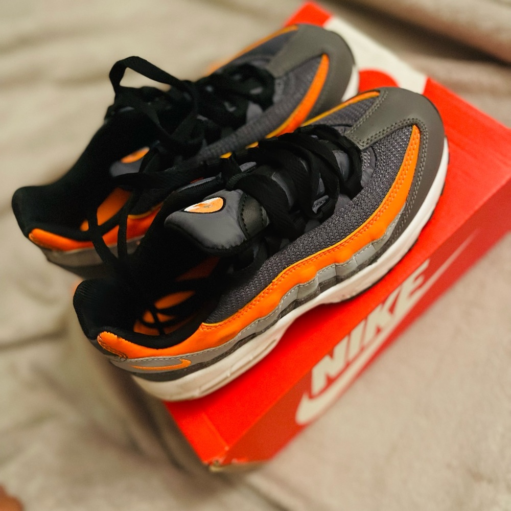 Orange , gray & black air max . Great condition size 2